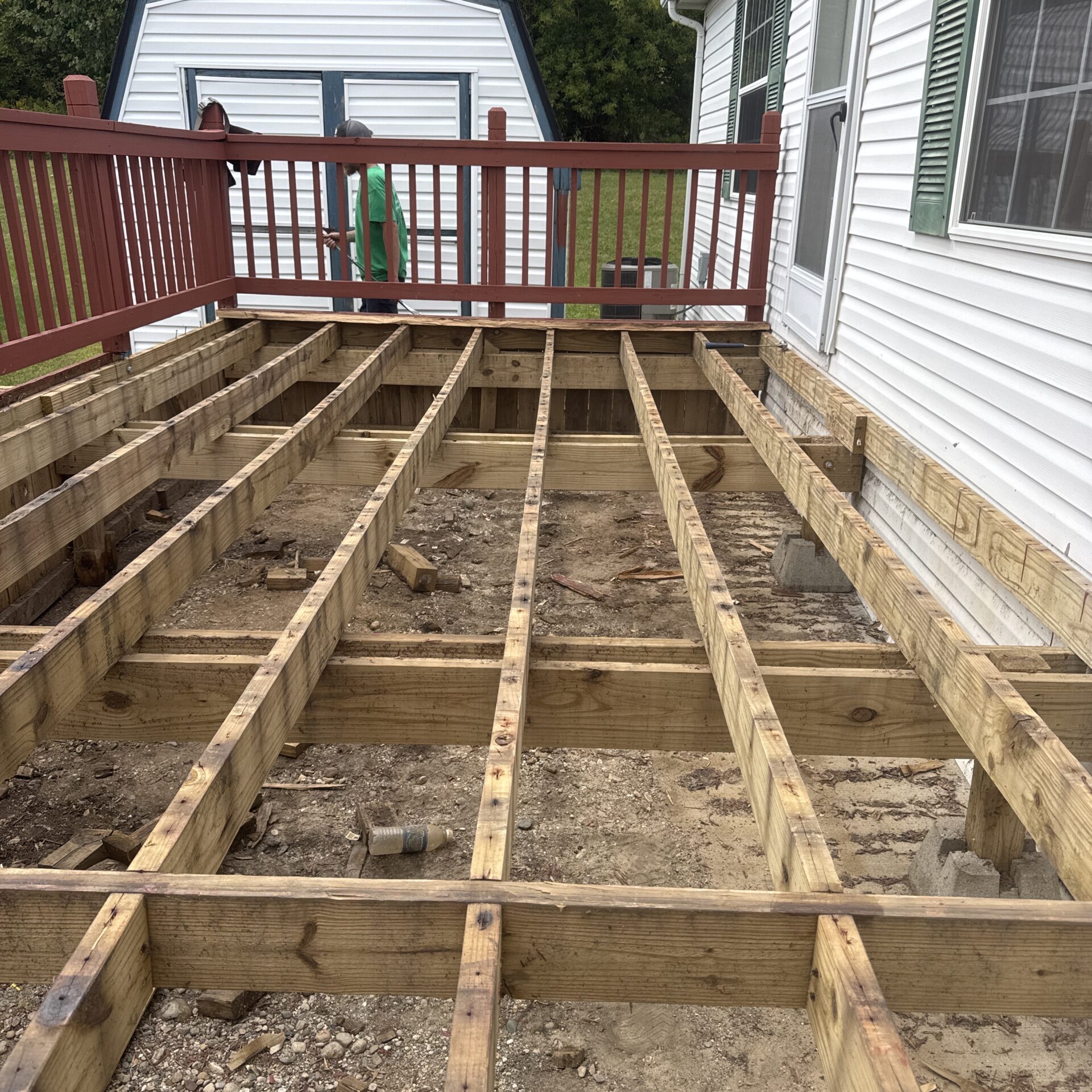 Wood deck with stairs and railing